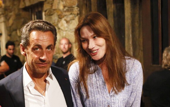 Nicolas Sarkozy et son épouse Carla Bruni - Le couple, tendre et complice, a assisté au concert de Julien Clerc dans le cadre du festival de Ramatuelle le 3 août 2013.