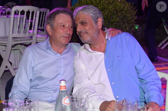 Michel Drucker et Enrico Macias à Saint-Tropez, le 4 août 2013.