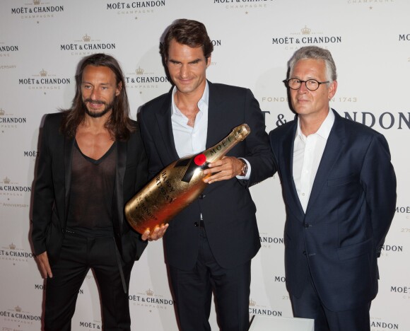 Bob Sinclar, Roger Federer et Stéphane Baschiera, président de Moët & Chandon, à New York le 20 août 2013.