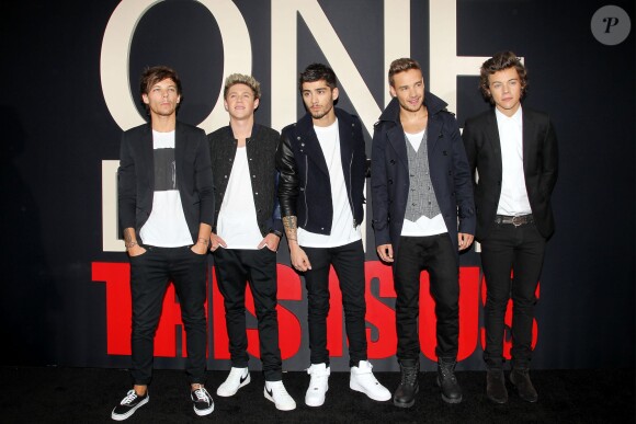 Louis Tomlinson, Niall Horan, Zayn Malik, Liam Payne et Harry Styles des One Direction, à l'avant-première de This Is Us au Ziegfeld Theatre, de New York, le 26 août 2013.
