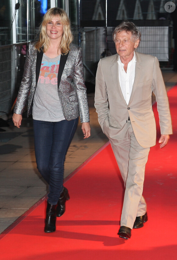 Emmanuelle Seigner et Roman Polanski à la première du film "Blue Jasmine" à l'UGC Bercy, Paris, le 27 août 2013.