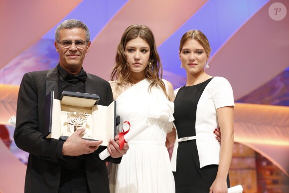 Abdellatif Kechiche (Palme d'Or pour "La vie d'Adèle"), Adèle Exarchopoulos et Léa Seydoux lors de la cérémonie de clôture du 66e festival du film de Cannes, le 26 mai 2013.