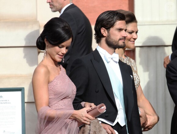 Le prince Carl Philip de Suède et Sofia Hellqvist - Mariage de Gustaf Magnuson (fils de la soeur du roi Carl XVI Gustaf de Suède) et Vicky Andren au château d'Ulriksdals à Stockholm, le 31 août 2013.