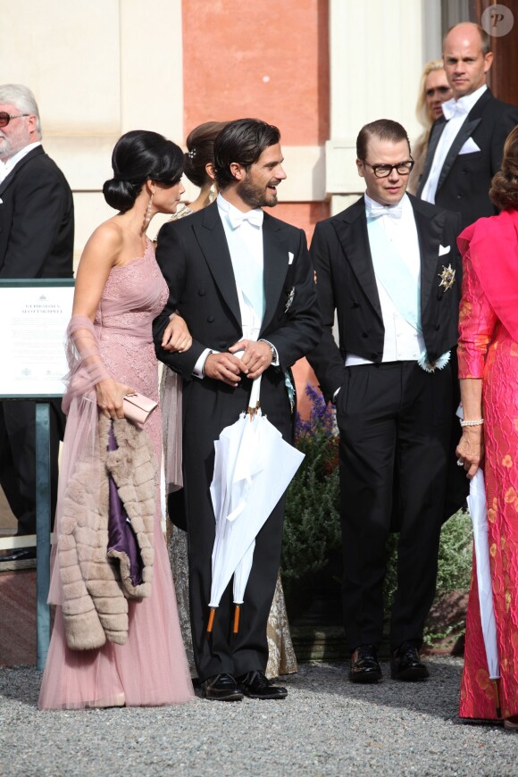 Le prince Carl Philip de Suède et Sofia Hellqvist, le Prince Daniel de Suède - Mariage de Gustaf Magnuson (fils de la soeur du roi Carl XVI Gustaf de Suède) et Vicky Andren au château d'Ulriksdals à Stockholm, le 31 août 2013.