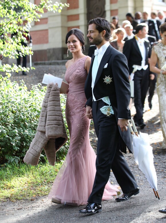 Le prince Carl Philip de Suède et Sofia Hellqvist - Mariage de Gustaf Magnuson (fils de la soeur du roi Carl XVI Gustaf de Suède) et Vicky Andren au château d'Ulriksdals à Stockholm, le 31 août 2013.