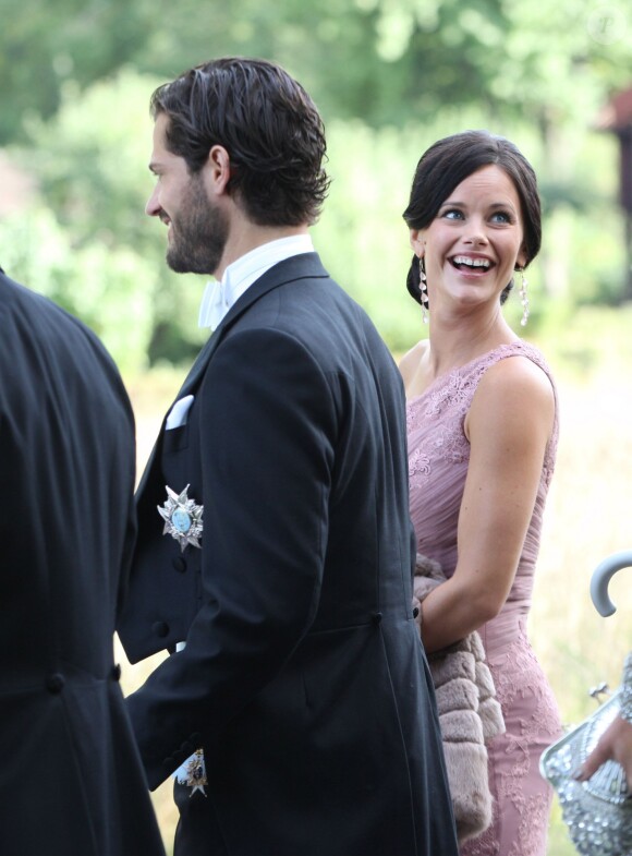 Le prince Carl Philip de Suède et Sofia Hellqvist - Mariage de Gustaf Magnuson (fils de la soeur du roi Carl XVI Gustaf de Suède) et Vicky Andren au château d'Ulriksdals à Stockholm, le 31 août 2013.