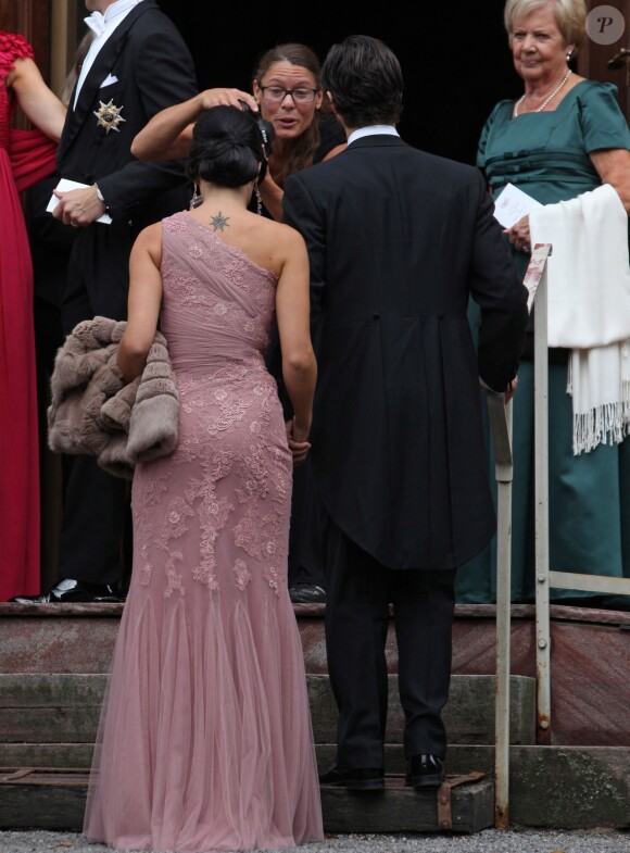 Le prince Carl Philip de Suède et Sofia Hellqvist - Mariage de Gustaf Magnuson (fils de la soeur du roi Carl XVI Gustaf de Suède) et Vicky Andren au château d'Ulriksdals à Stockholm, le 31 août 2013.