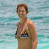 Exclusif - Kate Walsh passe ses vacances avec son compagnon Chris Case et les enfants de celui-ci, à Cancún au Mexique, le 31 août 2013.