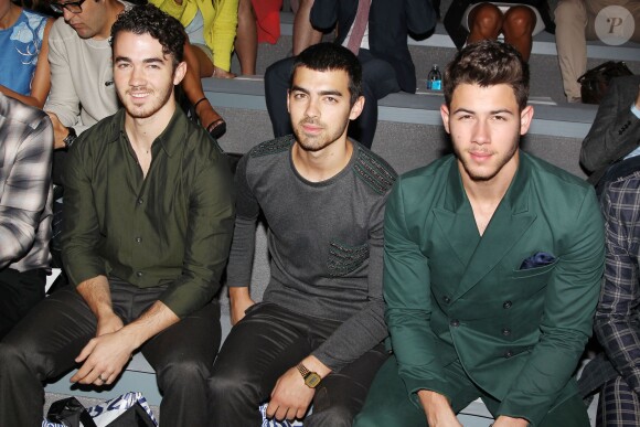 Kevin, Nick et Joe Jonas assistent au défilé Richard Chai printemps-été 2014 au Lincoln Center. New York, le 5 septembre 2013.