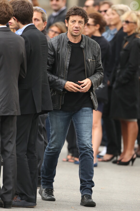 Patrick Bruel à la sortie des obsèques de Valérie Benguigui au cimetière du Montparnasse à Paris, le 6 septembre 2013.