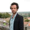 Romain Duris lors du photocall de 'Casse-Tête chinois' au festival du film d'Angoulême le 23 août 2013