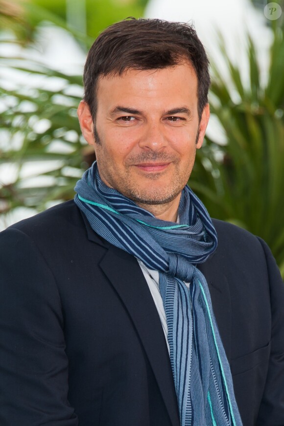 Le réalisateur Francois Ozon lors du photocall du film 'Jeune et Jolie' au Festival de Cannes le 16 mai 2013