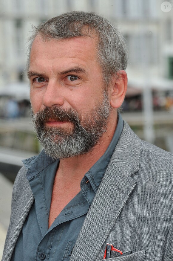 Philippe Torreton pose pour le photocall du téléfilm 'Intimes Convictions' durant le 15e Festival de la Fiction TV de La Rochelle. Le 12 septembre 2013.