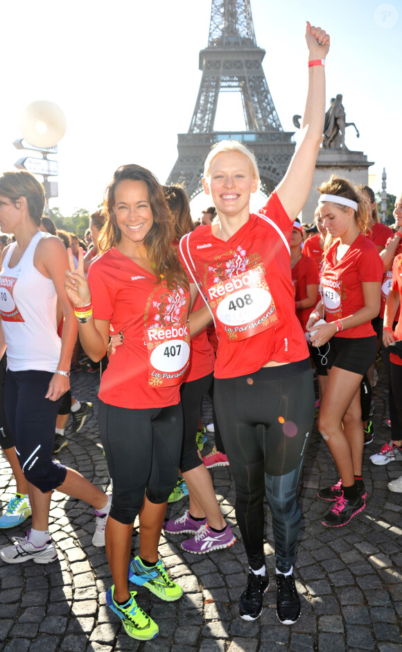 Karine Lima et Anna Sherbinina lors de la course La Parisienne qui se déroulait à Paris le 15 septembre 2013