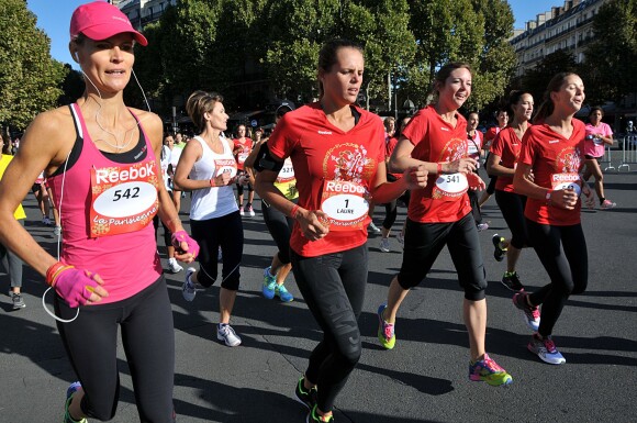 Laure Manaudou en plein effort lors de la course La Parisienne qui se déroulait à Paris le 15 septembre 2013