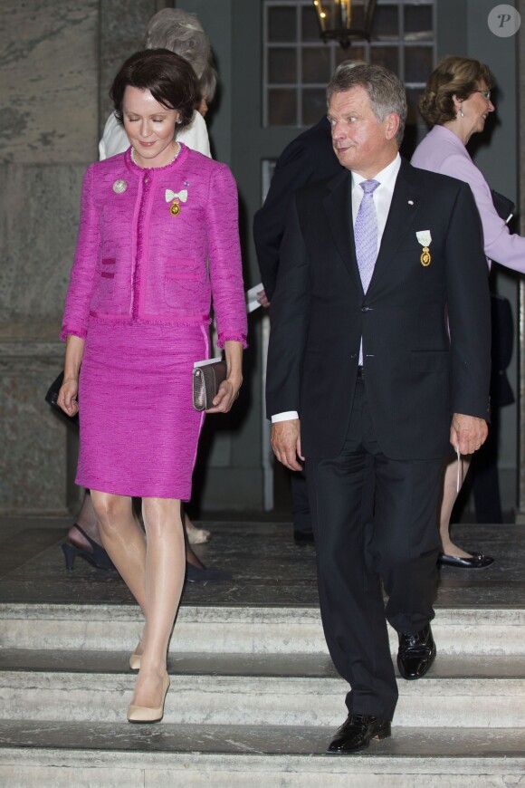 Le président finlandais Sauli Niinisto et sa femme Jenni Haukio au palais à Stockholm le 15 septembre 2013 pour le Te Deum du jubilé des 40 ans de règne du roi Carl XVI Gustaf de Suède dans la chapelle royale.