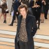 Harry Styles arrive au défilé de mode Burberry Prorsum, collection printemps-été 2014, lors de la fashion week de Londres. Le 16 septembre 2013