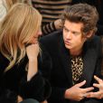 Défilé Burberry Prorsum, collection printemps-été 2014, lors de la fashion week de Londres. Le 16 septembre 2013London. Sienna Miller et Harry Styles en grande conversation.