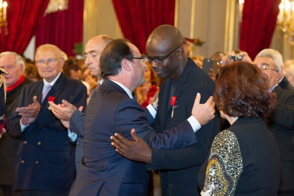 Lilian Thuram reçoit la Légion d'honneur à l'Elysée le 17 septembre 2013.