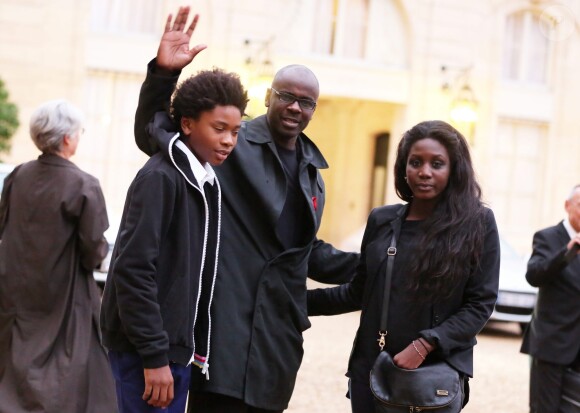 Lilian Thuram, décoré de la Légion d'honneur, et son fils Khephren à l'Elysée, le 17 septembre 2013.