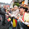 Le roi Philippe et la reine Mathilde de Belgique effectuaient le 17 septembre 2013 à Mons, chef-lieu de la province du Hainaut, la troisième étape de leur tournée Joyeuses entrées.