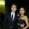 Nolan Funk et Selena Gomez au défilé Versace printemps-été 2014 à Milan, le 20 septembre 2013.