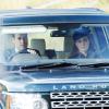 Le prince William et la duchesse Catherine de Cambridge à bord de leur Land Rover le 22 septembre 2013 sur la route de l'église Crathie de Balmoral, où ils ont assisté à la messe avec la reine Elizabeth II, le duc d'Edimbourg, le prince Charles et Camilla Parker Bowles.