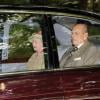 Le prince Philip et la reine Elizabeth II conduits le 22 septembre 2013 à l'église Crathie de Balmoral