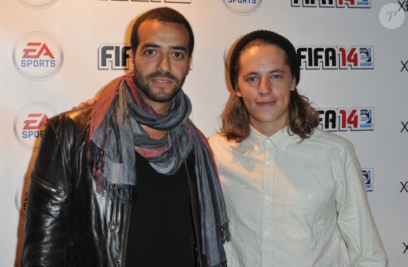 Tarek Boudali (La Bande à Fifi) et Pierre Sarkozy lors de la soirée de lancement de FIFA 14 à la Gaîté lyrique à Paris le 23 septembre 2013.