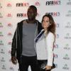 Omar Sy et son épouse Hélène lors de la soirée de lancement de FIFA 14 à la Gaîté lyrique à Paris le 23 septembre 2013. Au préalable, la vente de packs collector avait permis de lever 12 000 euros pour leur association Cé Ke Du Bonheur.