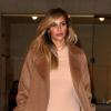 Kim Kardashian quitte l'atelier Armani Privé situé avenue Montaigne, dans le 8e arrondissement. Paris, le 30 septembre 2013.
