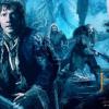 Bilbon et les Nains dans une bannière du film Le Hobbit : La Désolation de Smaug.