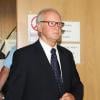 L'ex-kiné Pierre Pallardy arrive à la cour d'assises de Paris où debute son procès pour viols et agressions sexuelles sur plusieurs anciennes patientes le 3 octobre 2013.
