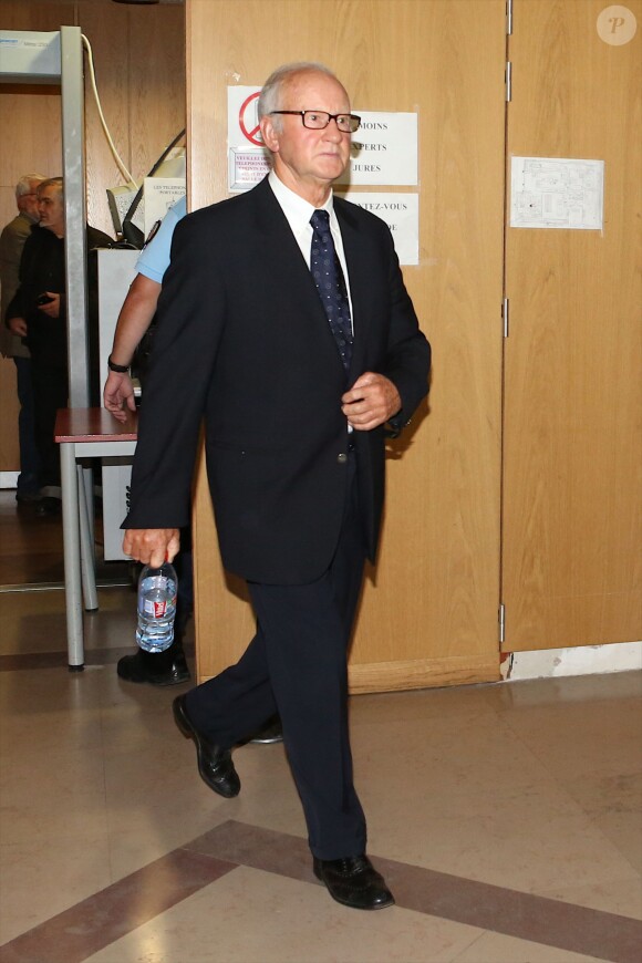 L'ex-kiné Pierre Pallardy arrive à la cour d'assises de Paris où debute son procès pour viols et agressions sexuelles sur plusieurs anciennes patientes le 3 octobre 2013.