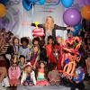 Heidi Klum, entourée d'enfants mannequins lors du défilé Truly Scrumptious. New York, le 5 octobre 2013.