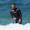 Liam Payne et Louis Tomlinson apprennent à faire du surf sur une plage de Sydney, le 7 octobre 2013.