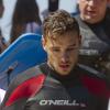 Liam Payne du groupe One Direction fait du surf sur une plage de Sydney, le 7 octobre 2013.