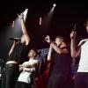 Zayn Malik, Louis Tomlinson, Harry Styles, Niall Horan, Liam Payne des One Direction sur scène à Adelaide, Australie, le 23 septembre 2013.