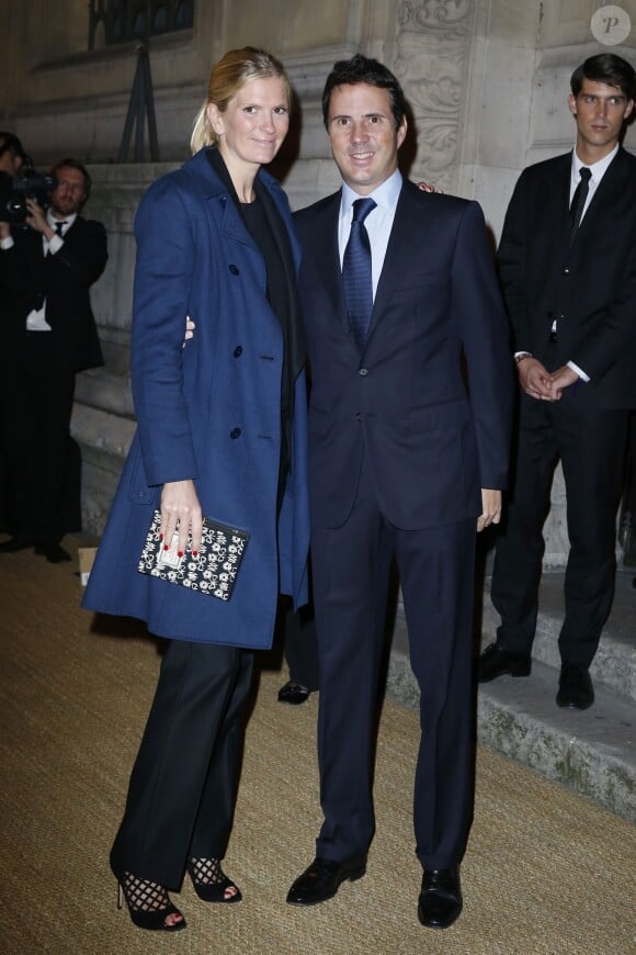 Ségolène Frère et Ian Gallienne assistent à la présentation de la collection automne-hiver de Ralph Lauren, lors d'un dîner mécénat avec les Beaux-Arts de Paris dans la cour Chimay de l'école des Beaux-Arts. Paris, le 8 octobre 2013.