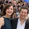 Marion Cotillard et Guillaume Canet lors du photocall du film Blood Ties au Festival de Cannes le 20 mai 2013