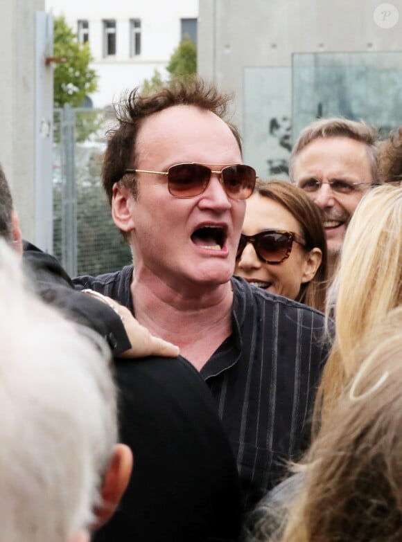 Quentin Tarantino revisitant La Sorties des usines Lumière dans le cadre du Festival Lumière à Lyon le 19 octobre 2013