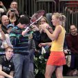 Rory McIlroy et Caroline Wozniacki au Madison Square Garden de New York lors d'un match exhibition le 5 mars 2012