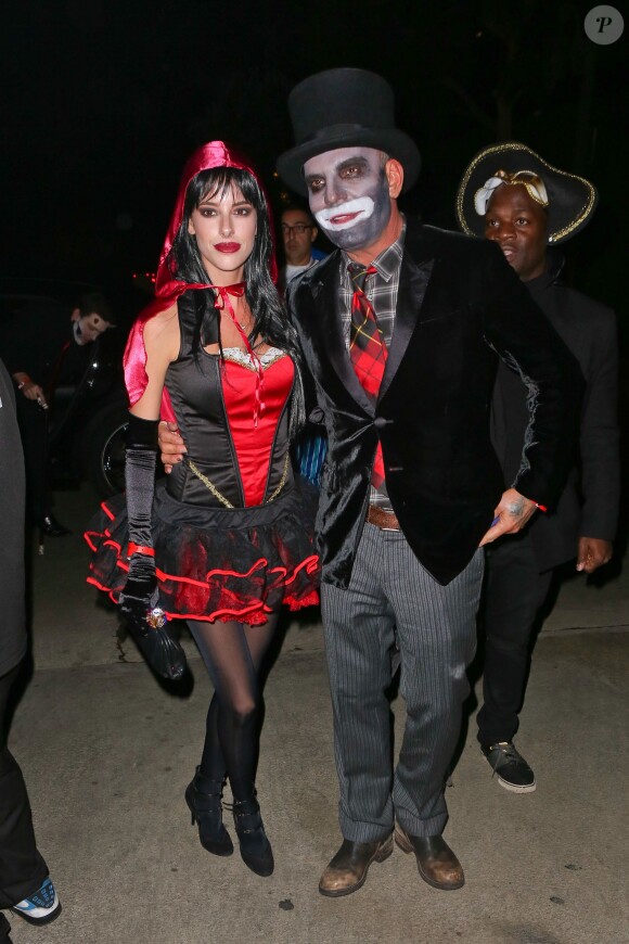 Christian Audigier et Nathalie Sorensen à la soirée Halloween donnée à la Playboy Mansion, à Los Angeles, le 26 octobre 2013.