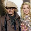 Johnny Depp et Amber Heard au photocall du film "Rhum Express" à Paris le 8 novembre 2011.