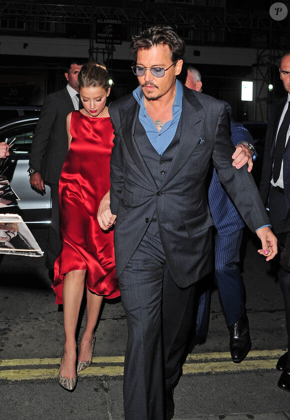 Johnny Depp et Amber Heard à Londres le 21 juillet 2013.