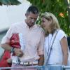 Iñaki Urdangarin et son épouse l'infante Cristina d'Espagne à Genève le 30 août 2013. En instance de procès, le gendre du roi Juan Carlos Ier a vu la justice ordonner la saisie de ses biens le 4 novembre 2013 pour couvrir sa caution de 6,1 millions d'euros dans le cadre du scandale Noos.