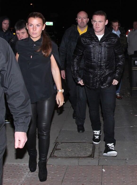 Wayne et Coleen Rooney lors d'un dîner à l'Australasia Bar & Restaurant de Manchester, le 7 novembre 2013 avant d'assister au concert de Jake Bugg