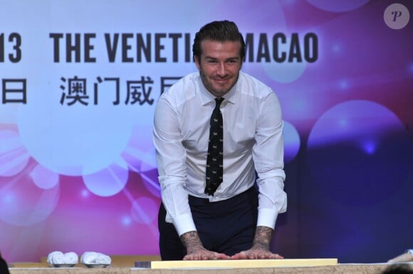 David Beckham dépose l'empreinte de ses mains au Venetian Macao Resort Hotel. La petite cérémonie a été suivie d'une conférence de presse. Macao, le 22 novembre 2013.