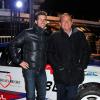 Jean-Pierre Pernaut et son fils Olivier posent devant leur Citroen DS3 lors de la conférence de presse de la 25e édition du Trophée Andros à Paris le 27 novembre 2013.