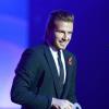 David Beckham reçoit son prix lors des GQ Men Of The Year Awards à Berlin. Le 7 novembre 2013.